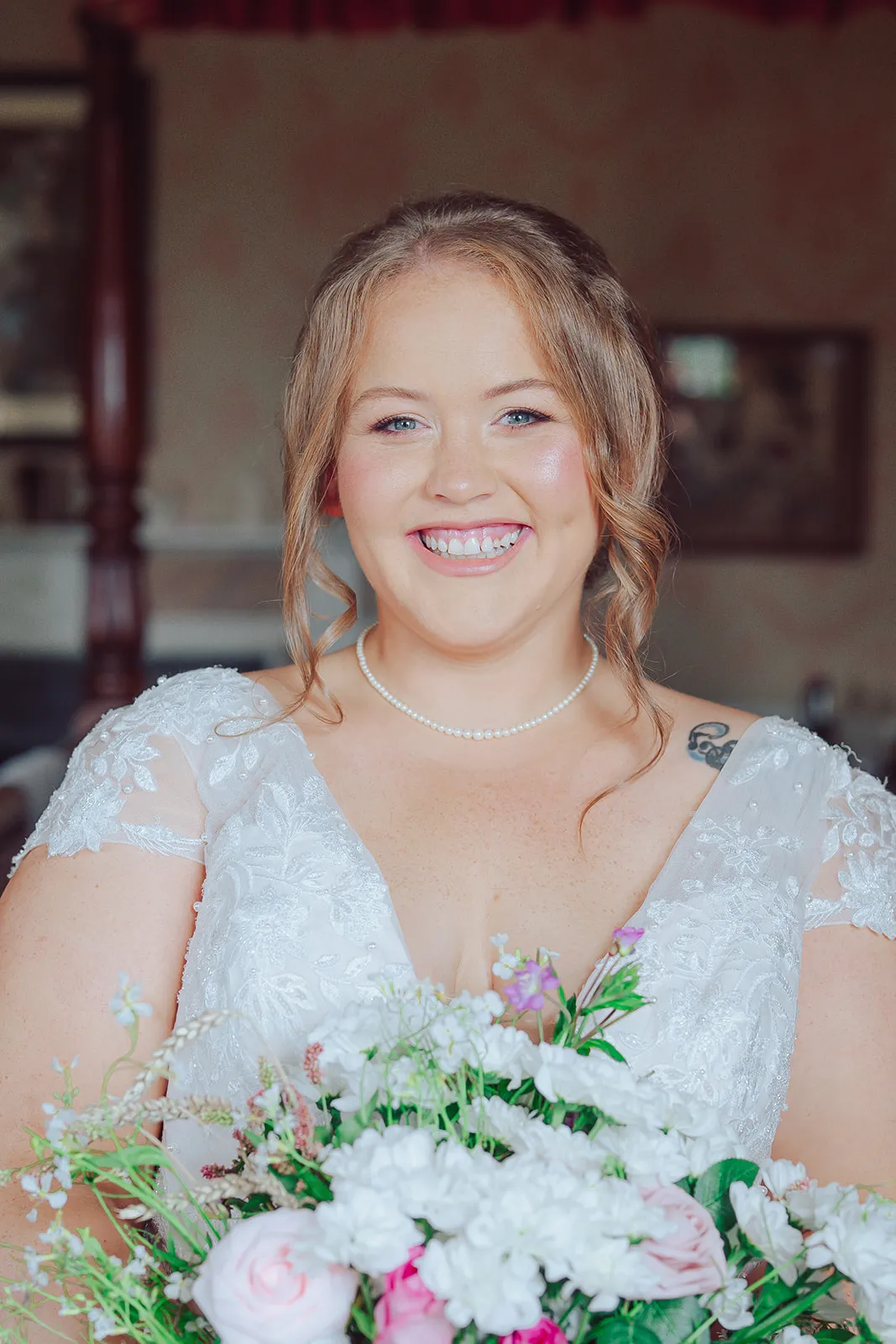 bride having makeup done