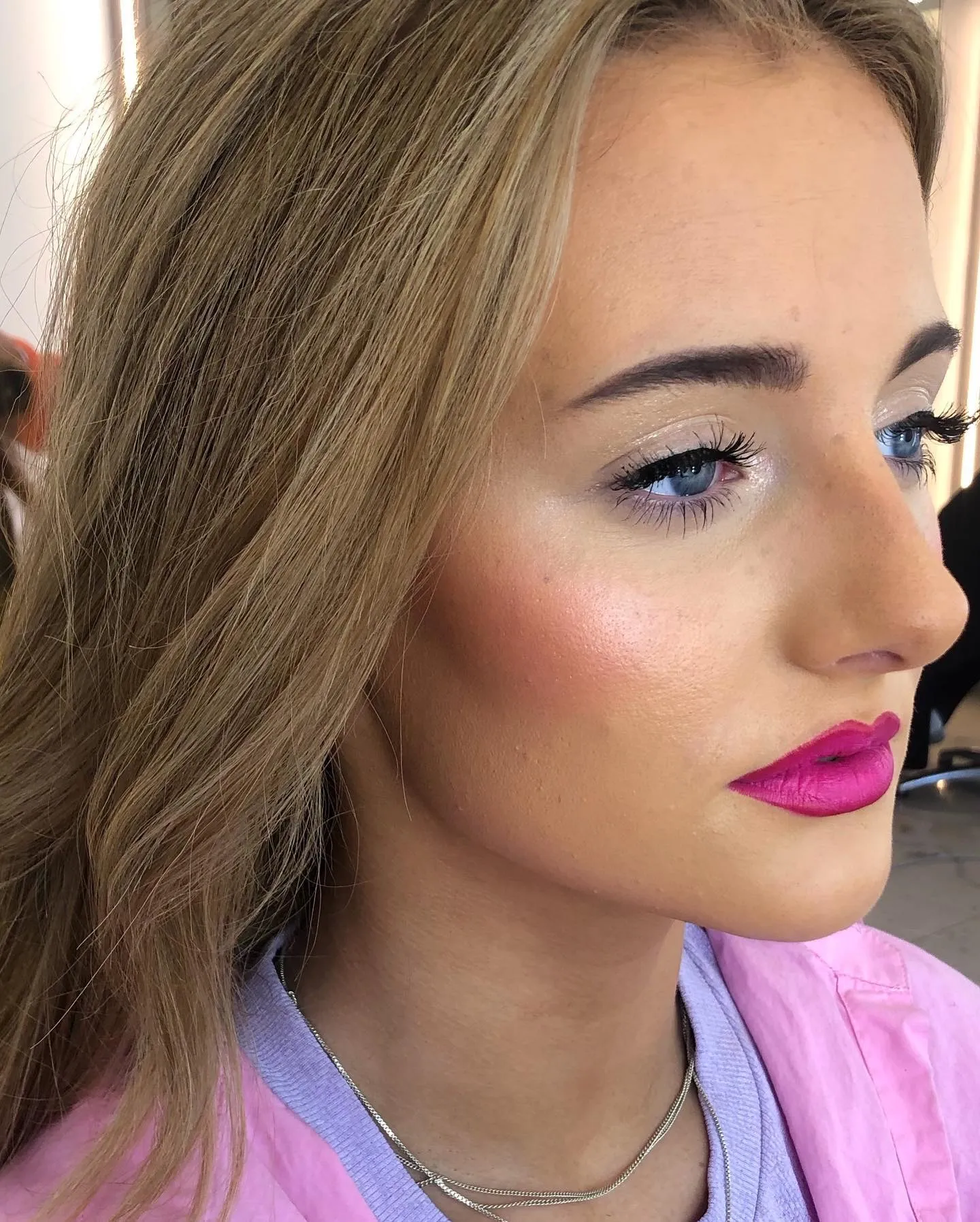 bride having makeup done